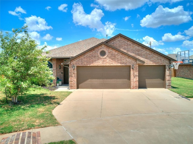 view of front of home featuring a garage and a front yard