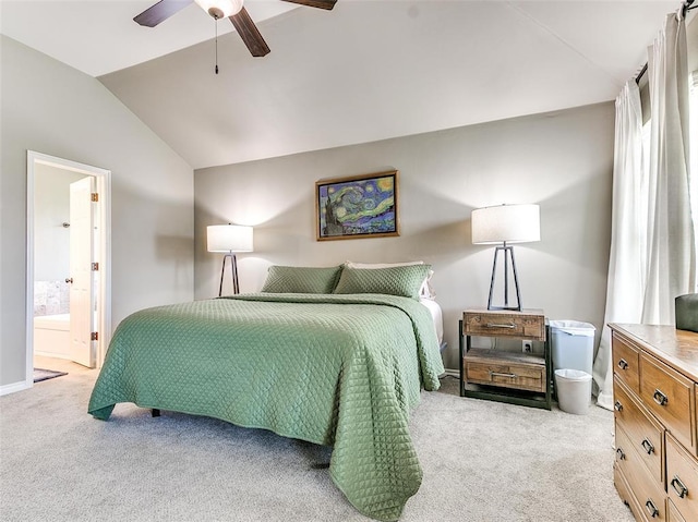 carpeted bedroom featuring ensuite bathroom, ceiling fan, and lofted ceiling