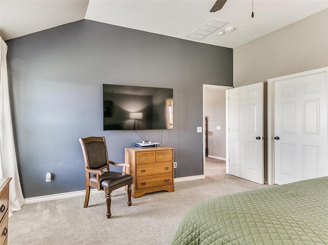 bedroom featuring ceiling fan, lofted ceiling, and light colored carpet