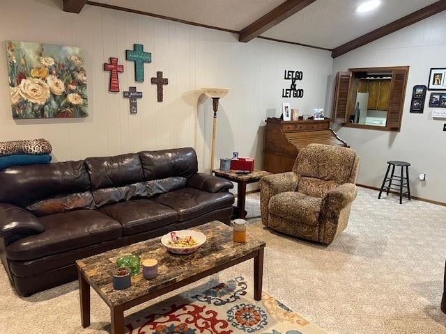 carpeted living room with vaulted ceiling with beams and crown molding