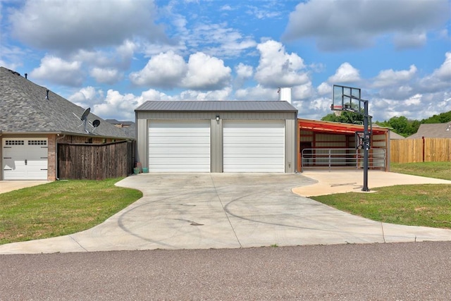 garage featuring a lawn