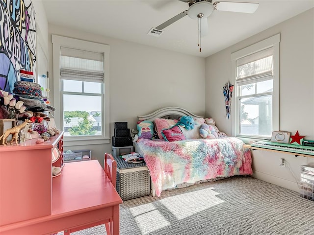 carpeted bedroom featuring ceiling fan