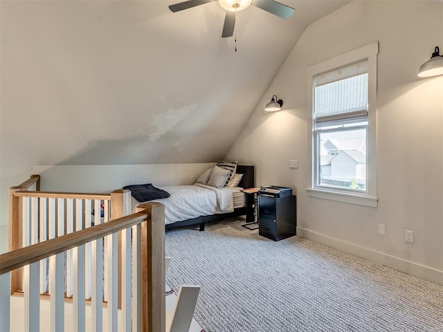 bedroom featuring ceiling fan, carpet floors, and lofted ceiling