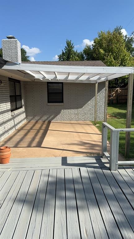 deck featuring a lawn