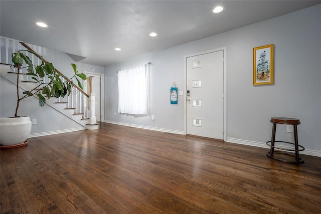 foyer with dark hardwood / wood-style flooring