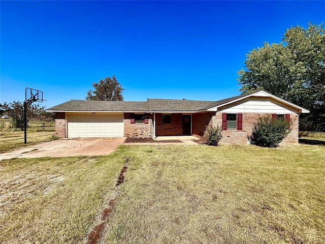 ranch-style home featuring a garage and a front lawn