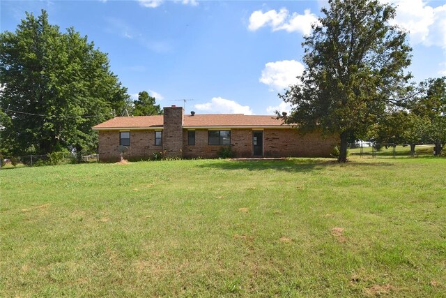 exterior space with a front yard