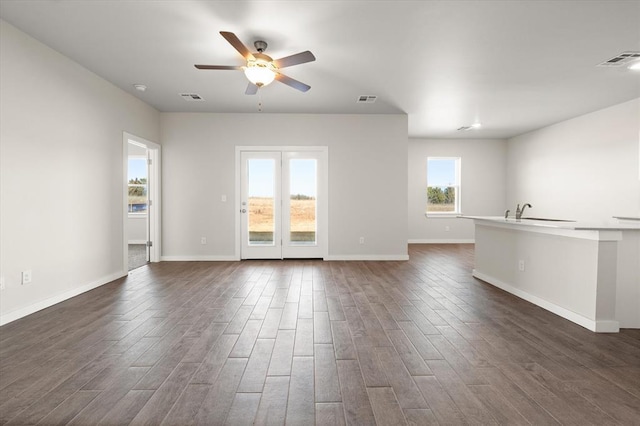 spare room featuring ceiling fan and sink