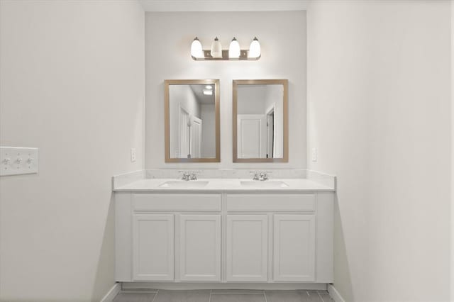 bathroom with vanity and tile patterned floors