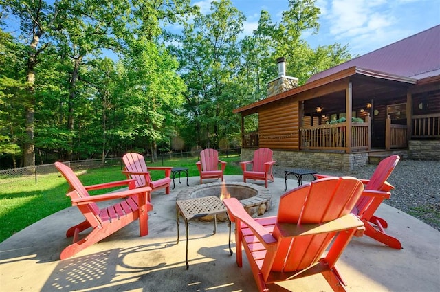 view of patio / terrace featuring an outdoor fire pit