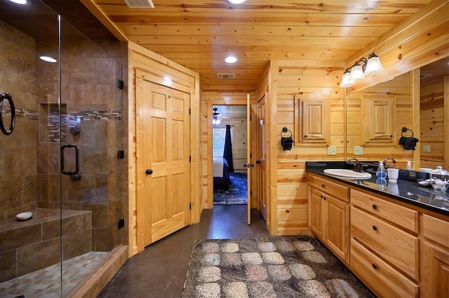 bathroom with vanity, wooden ceiling, wooden walls, walk in shower, and concrete flooring