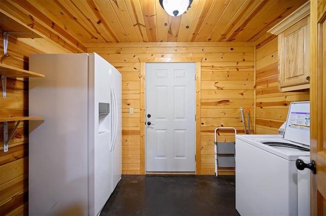 clothes washing area with wood walls, cabinets, and wood ceiling