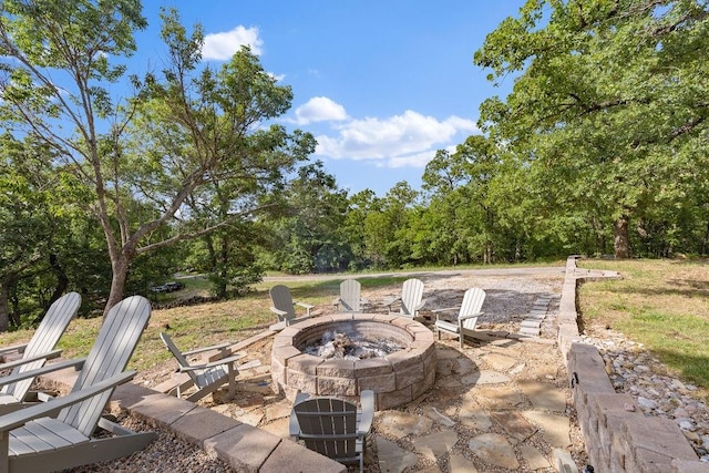 view of patio featuring a fire pit