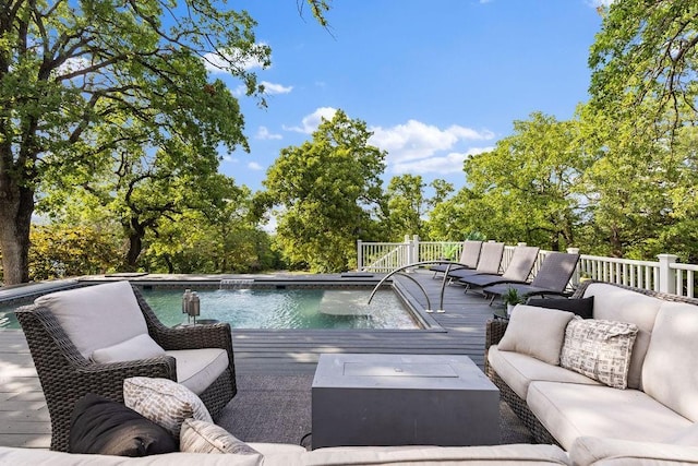 4545 Chickasaw Trl, Sulphur, OK 73086 - wooden terrace featuring an outdoor living space with a fire pit, an outdoor pool, and view of scattered trees