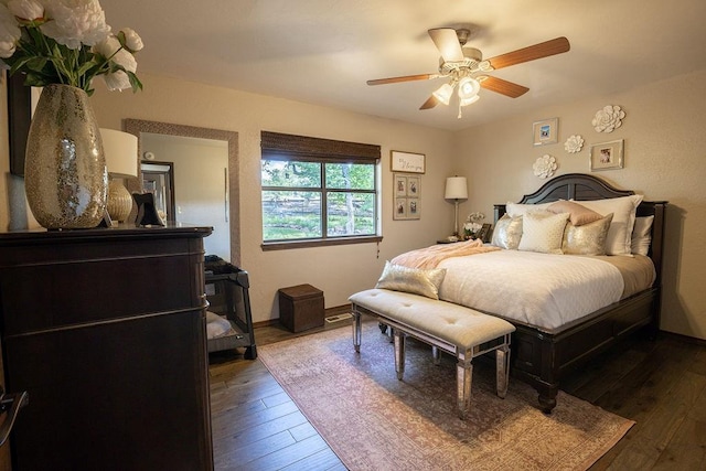 bedroom featuring hardwood / wood-style flooring and ceiling fan