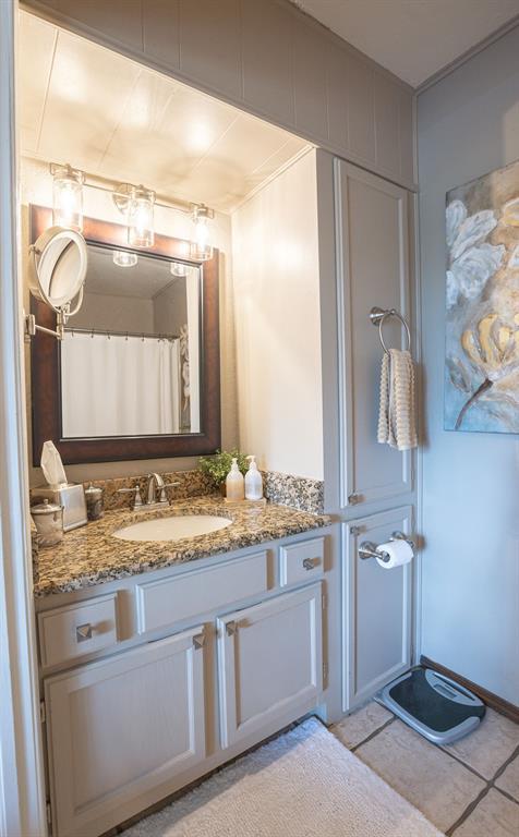 4545 Chickasaw Trl, Sulphur, OK 73086 - bathroom featuring vanity and tile patterned flooring
