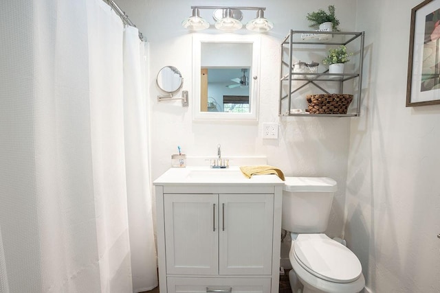 4545 Chickasaw Trl, Sulphur, OK 73086 - bathroom with toilet, vanity, and curtained shower