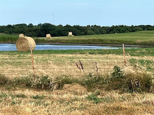 view of water feature with a rural view