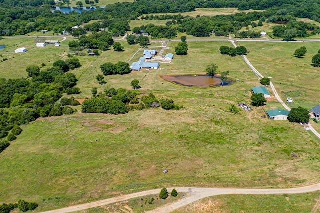 bird's eye view featuring a rural view and a water view