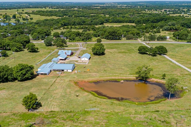 drone / aerial view with a water view and a rural view