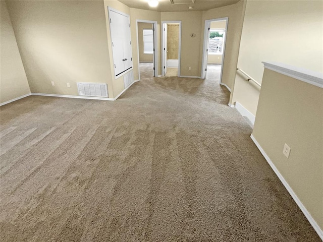 empty room featuring carpet floors