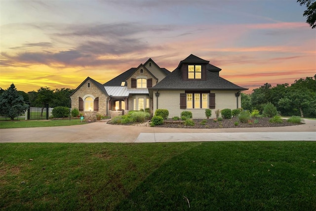 view of front of home featuring a yard