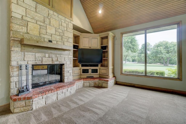 unfurnished living room featuring high vaulted ceiling, carpet, baseboards, wood ceiling, and a fireplace
