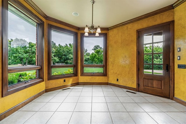 unfurnished sunroom featuring visible vents, a notable chandelier, and plenty of natural light