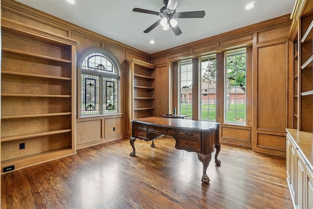 home office featuring a decorative wall, wood finished floors, recessed lighting, and a ceiling fan