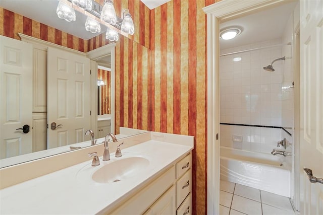full bath with vanity, wallpapered walls, tile patterned flooring, and bathing tub / shower combination
