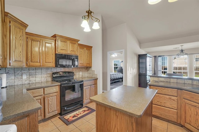 kitchen featuring a center island, tasteful backsplash, decorative light fixtures, light tile patterned flooring, and black appliances