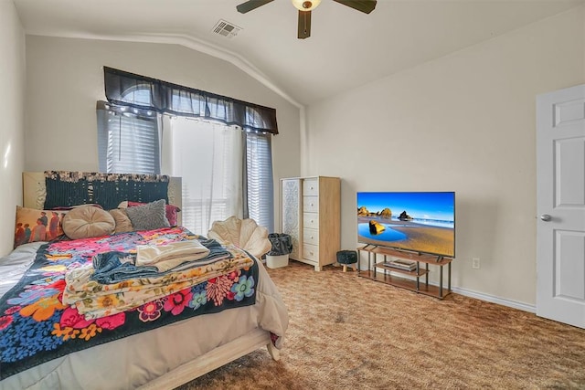 carpeted bedroom with ceiling fan and lofted ceiling