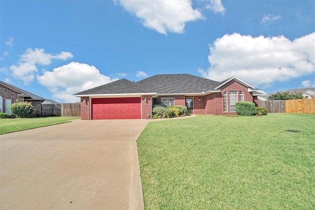 single story home featuring a front yard and a garage