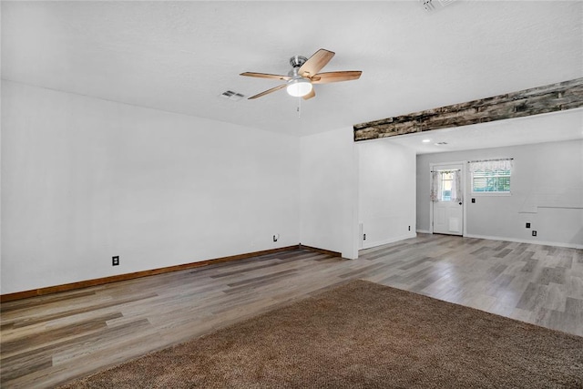 interior space with ceiling fan and hardwood / wood-style floors