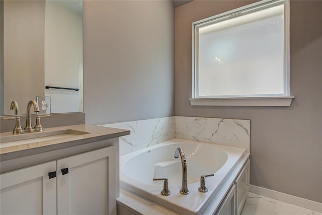 bathroom with a bathtub and vanity