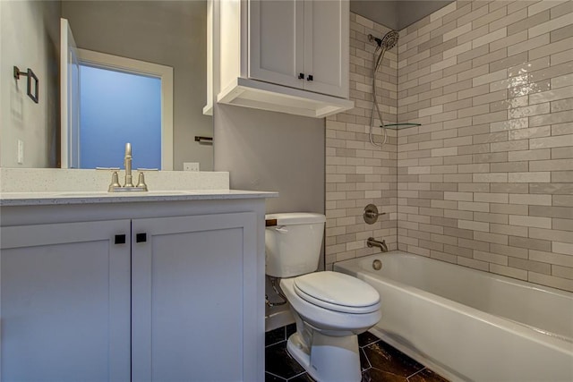 full bathroom with vanity, toilet, and tiled shower / bath