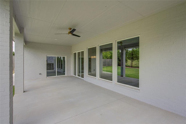 view of patio / terrace featuring ceiling fan