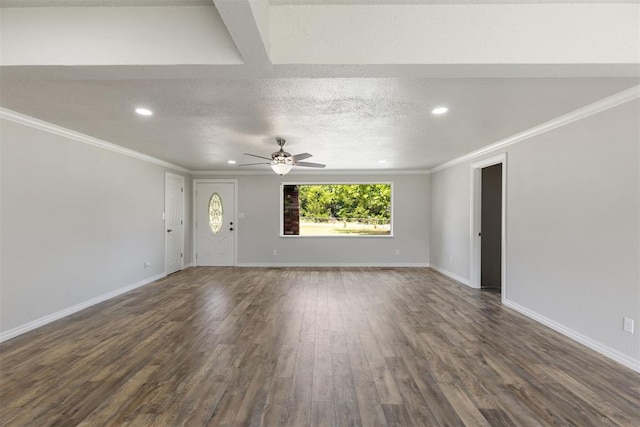 unfurnished living room with a textured ceiling, ceiling fan, ornamental molding, and dark wood-type flooring