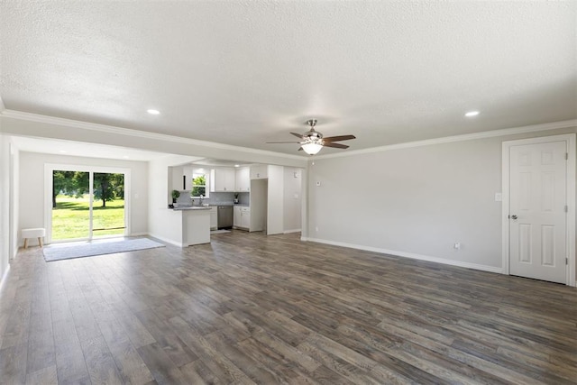 unfurnished living room featuring a textured ceiling, ceiling fan, ornamental molding, and dark wood-type flooring