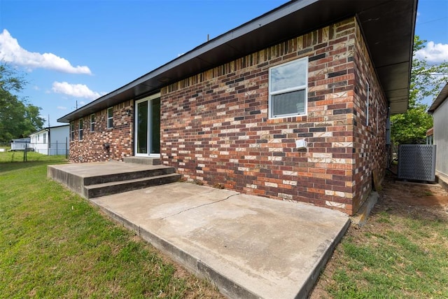 exterior space with a yard and a patio