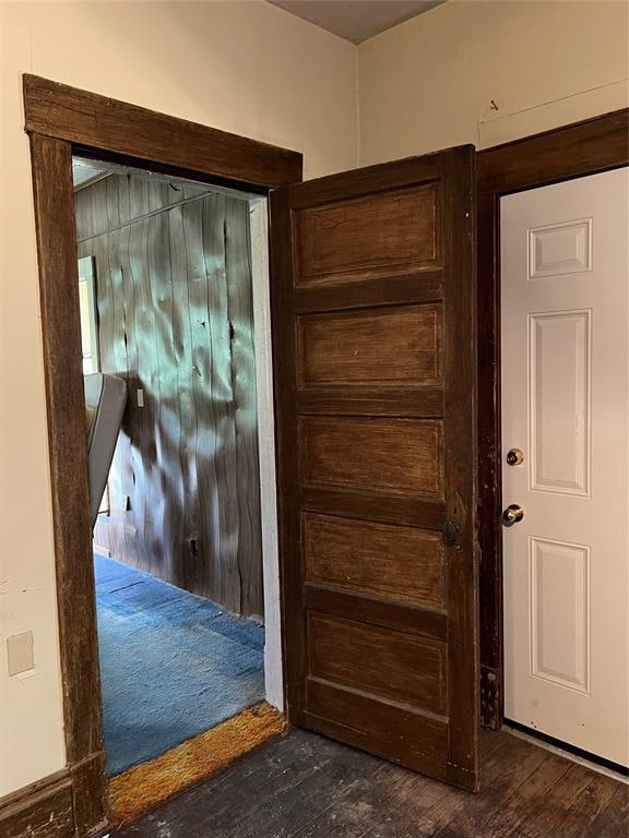 interior space with dark hardwood / wood-style flooring