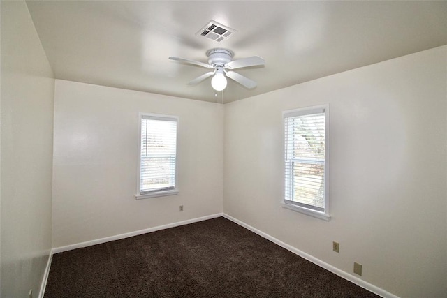 carpeted empty room with ceiling fan