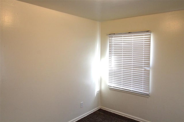 spare room featuring carpet flooring