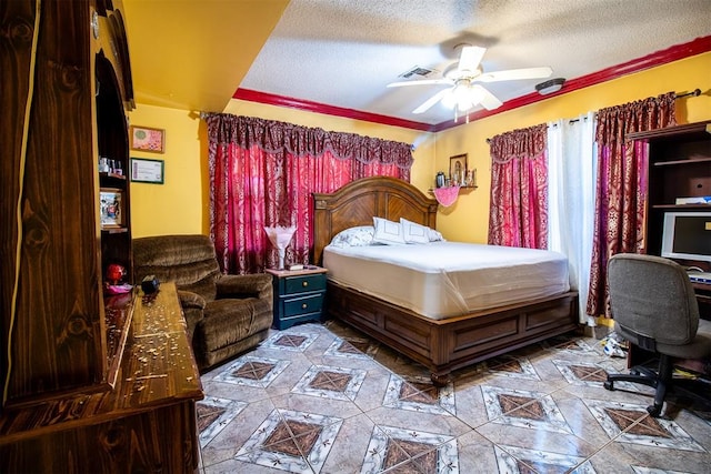 bedroom with ceiling fan, crown molding, and a textured ceiling