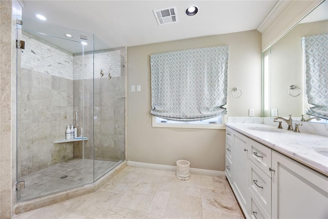 bathroom with vanity and walk in shower