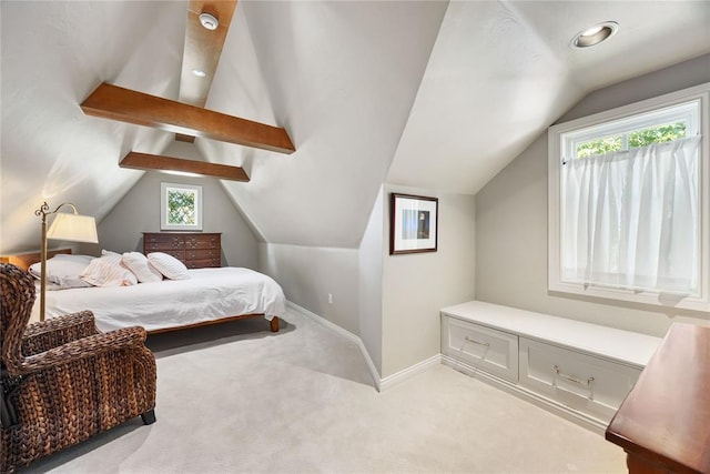 carpeted bedroom featuring lofted ceiling