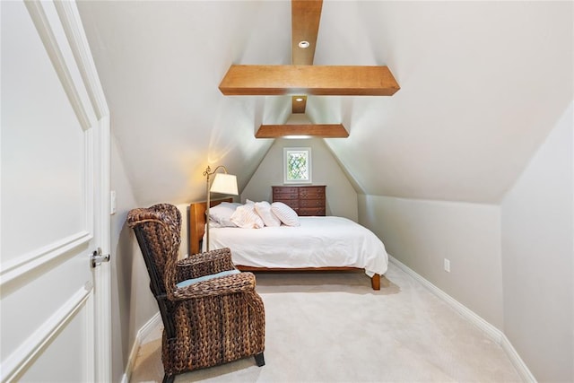 bedroom featuring carpet and vaulted ceiling