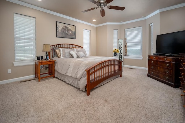 bedroom featuring ceiling fan, light colored carpet, and ornamental molding