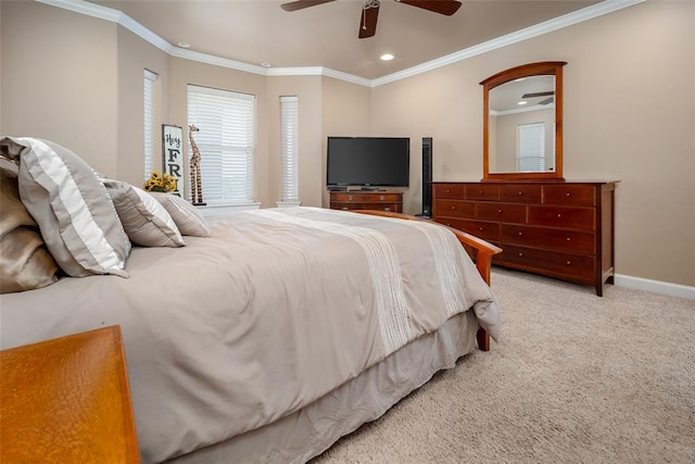 bedroom with ceiling fan, light carpet, and ornamental molding