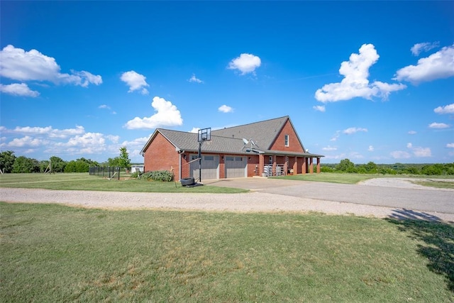 log home with a front lawn and a garage